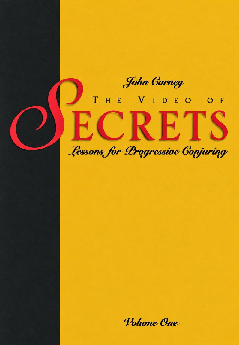 The Video of Secrets Volume One cover in yellow, red, and charcoal
