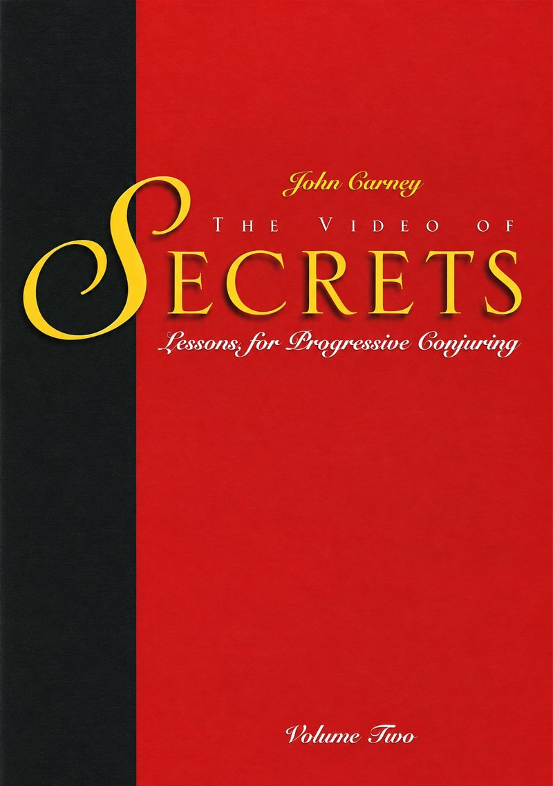 The Video of Secrets Volume Two cover in red, gold, and charcoal